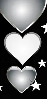 Elegant silver hearts and stars on a black mobile wallpaper.