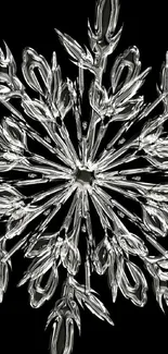 Elegant silver snowflake on black background for mobile wallpaper.