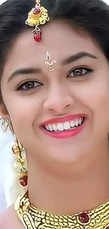 Elegant smiling woman in traditional attire with jewelry.