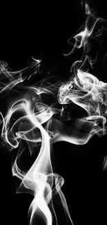 White smoke swirling on a black background, creating an elegant and mysterious effect.