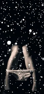 Elegant mobile wallpaper with snowfall and a black background.