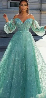 Woman in an elegant turquoise gown.