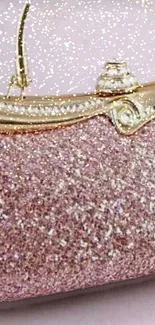 Sparkly pink purse with gold accents wallpaper.