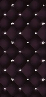 Elegant dark tufted wallpaper with stars.