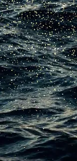 Wallpaper of starry specks on dark ocean waves, creating a calming effect.