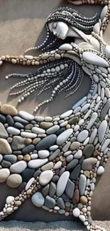 Elegant stone art of dancer made from pebbles.