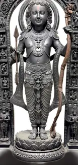 Intricate stone sculpture of a deity with a bow and arrow, surrounded by detailed carvings.