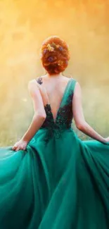 Woman in emerald dress at sunset, elegant wallpaper.