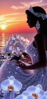Elegant woman by the ocean during a sunset, holding flowers.