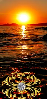 Sunset over ocean with golden jewel design on mobile wallpaper.