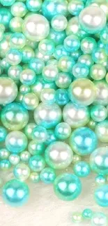 Teal and pearl beads wallpaper with a luxurious feel.