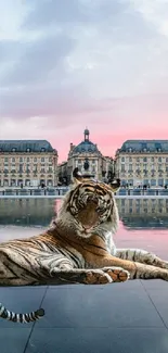 A majestic tiger sits by a serene palace with a pastel sunset sky and water reflection.