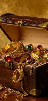 Open treasure chest with gold and gemstones spilling out.