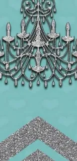 Turquoise wallpaper with a silver chandelier and chevron glitter design.