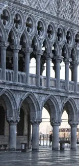 Venetian Gothic architecture with arches and intricate stonework.