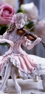 Elegant figurine playing violin with floral backdrop.