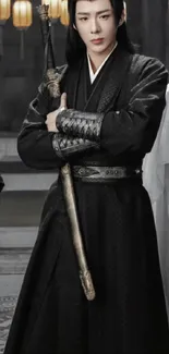 Elegant warrior in black robe with a mysterious backdrop.