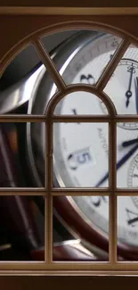 Elegant watch viewed through an arched window frame.