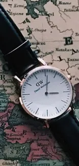 Classic watch on a vintage map background, exuding timeless elegance.