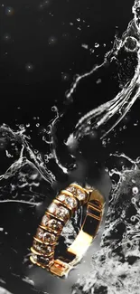 Gold ring with water splashes on black background wallpaper.