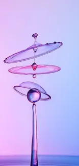 Mobile wallpaper of artistic water droplets with pink and purple tones.