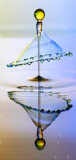 Elegant water droplet art with blue and gold hues.