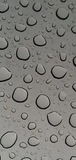 Gray wallpaper with realistic water droplets for mobile devices.