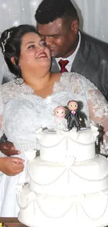 Couple embracing beside elegant wedding cake