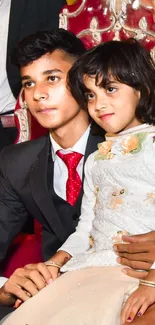 Indian wedding scene with traditional attire.