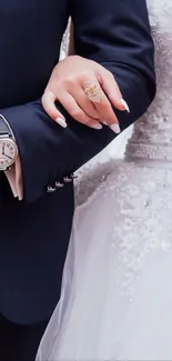 Elegant wedding couple with bouquet and formal attire.