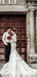 Bride and groom in front of vintage wooden church door.