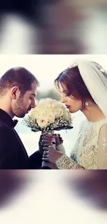 Elegant bride and groom with bouquet.