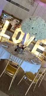 Elegant wedding decor with love letters and banquet table.