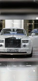 Luxury white car with digital overlay elements in background.