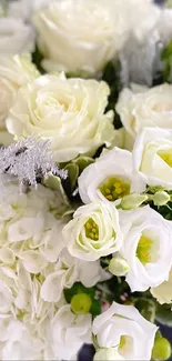 Elegant white floral bouquet with green leaves.