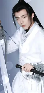 Asian warrior in white attire holding a sword, striking an elegant pose.