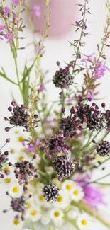 Vibrant wildflower bouquet with purple hues.