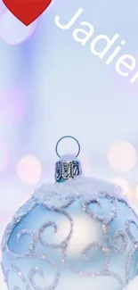 Snow-covered ornament with bokeh lights