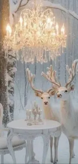Two white deer stand under a chandelier in a snowy forest setting.