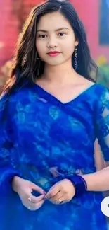 Elegant woman in a vibrant blue saree