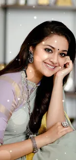 Elegant woman in traditional saree smiling gracefully.