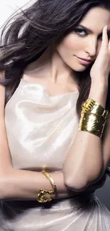 Elegant woman with shiny dress and gold accessories