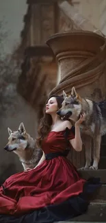 Woman in a red dress with two wolves on a stone staircase.