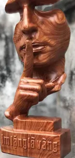 Wooden sculpture depicting a face in an artistic, elegant style for a mobile wallpaper.