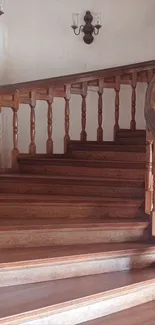 Elegant wooden staircase with classic design and warm rustic tones.