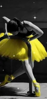 Ballerina in yellow tutu with dark background.