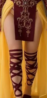 Elegant yellow costume with intricate design.