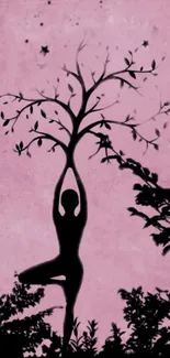 Silhouette of yoga pose with tree branches on pink background.