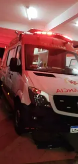 Emergency ambulance with red lights at night.