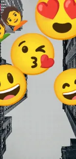 Vibrant emojis over a monochrome cityscape background.